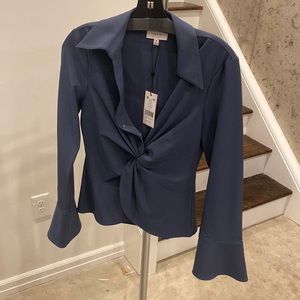 Long-sleeved crepe blouse with twist detail.